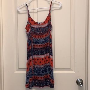 Multipattern dress. Corset tying.